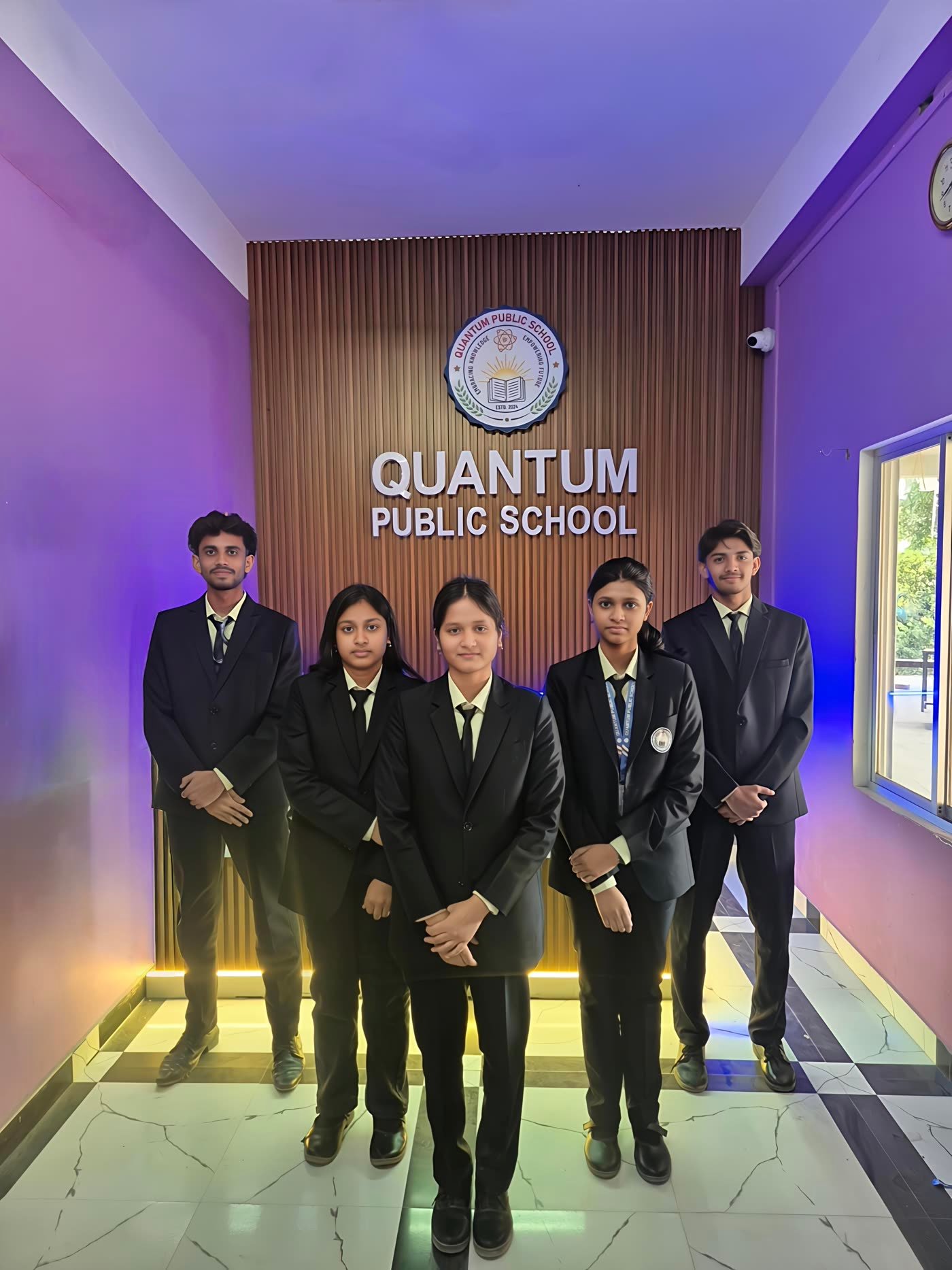 Students of Quantum Public School in uniform at the school reception